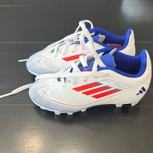 Adidas White and Red Soccer Cleats with Blue Accents